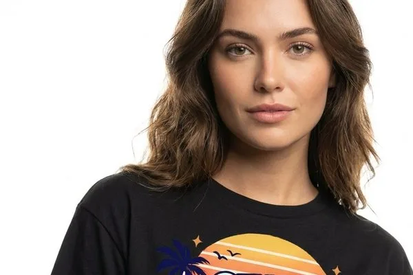 AI photoshoot result: a woman with long brown hair wearing the black Stay Rad t-shirt on a white studio background