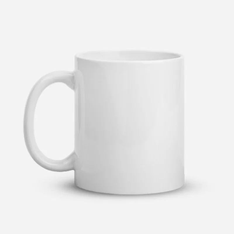 Blank white glossy ceramic mug with the handle on the left, for a custom mug mockup